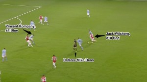 kompany-tackle-on-wilshere-01